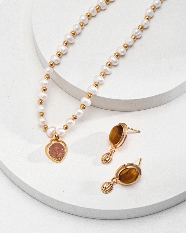 a 18K gold plated silver pearl strawberry crystal necklace and tiger-eye vintage earrings