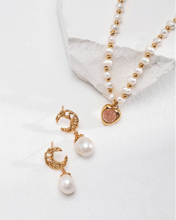 a 18K gold plated silver pearl strawberry crystal necklace and moon pearl earrings