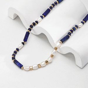 a 18K gold plated silver necklace with Lapis Lazuli and Pearls beads