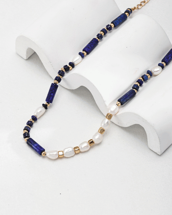 a 18K gold plated silver necklace with Lapis Lazuli and Pearls beads