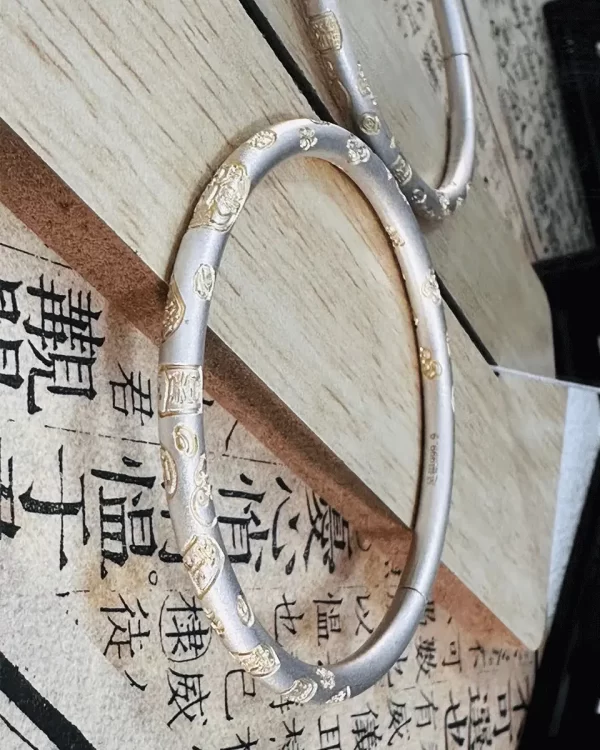 Sterling silver embossed gold-painted auspicious words bracelet