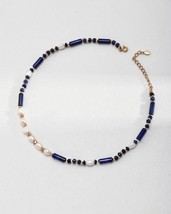 a 18K gold plated silver necklace with Lapis Lazuli and Pearls beads