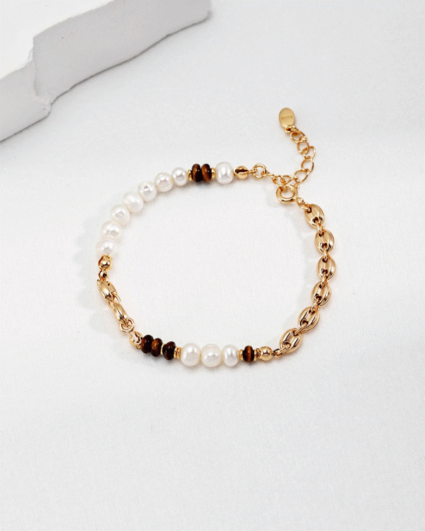 a 18K gold plated silver adjustable pearl tiger-eye bracelet